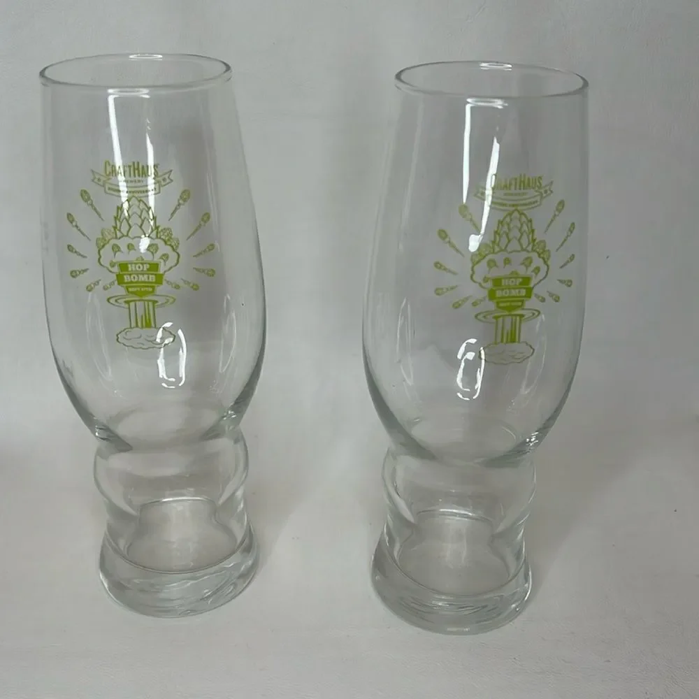 Craft Haus Beer Bomb Glasses 16 Oz Set Of 2 Clear Green Writing 7 1/2 Tall